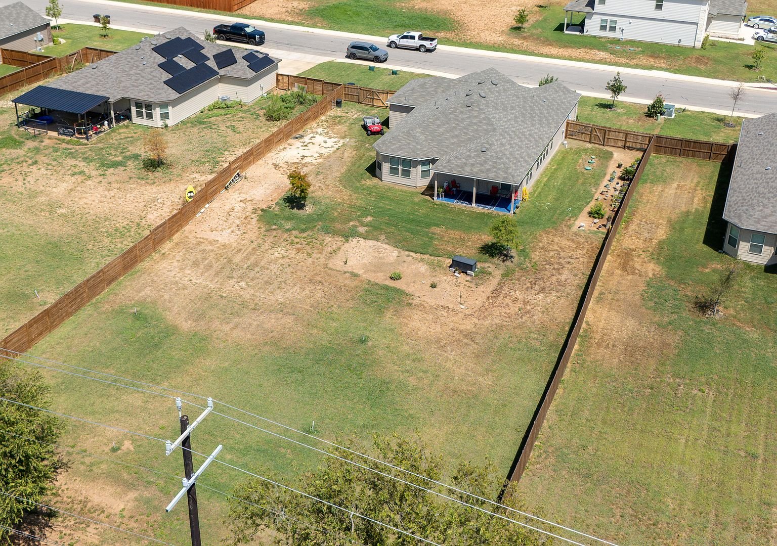 Aerial view of the lot and fence line